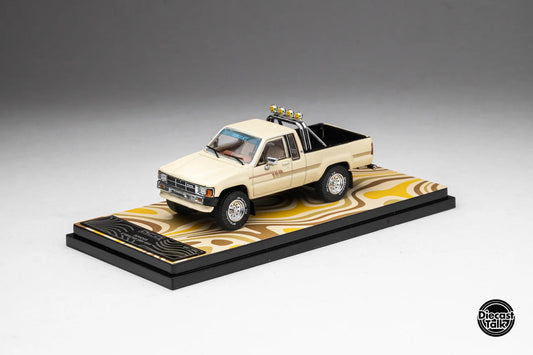DiecastTalk Exclusive GCD 1985 Toyota Hilux SR5 Xtracab Beige with Accessories Aussie Diecast